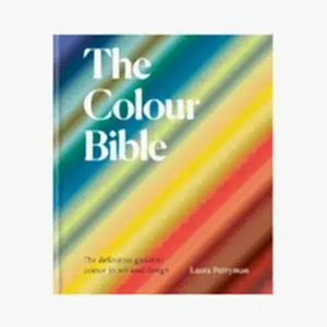 Cover of The Colour Bible: The definitive guide to colour in art and design has a rainbow of colours spread diagonally with the title on the left top corner.